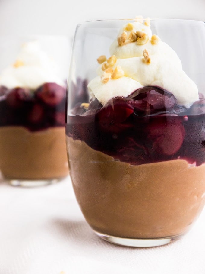 These No Bake Nutella Cheesecake Cherry Parfaits are super indulgent! And they come in a glass.