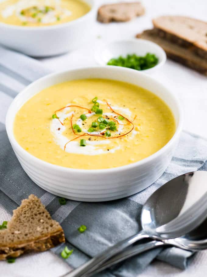 This Curried Cream of Corn Soup is creamy, a little bit spicy, and full of flavor! It makes a great weeknight meal - 15 minutes and you have a delicious meal. Serve with baguette or pita bread!