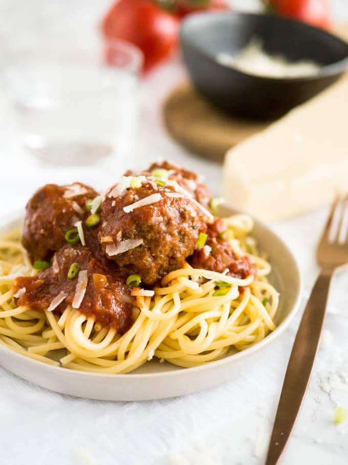 Easy Crockpot Italian Meatballs smothered in a homemade marinara sauce made with Italian herbs and balsamic vinegar. This recipe comes together in minutes and will have everybody begging for seconds!