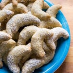 Vanillekipferl (German Vanilla Crescent Cookies) are traditional German Christmas Cookies made with ground hazelnuts or almonds! They are crispy and buttery and become even better after a few days.