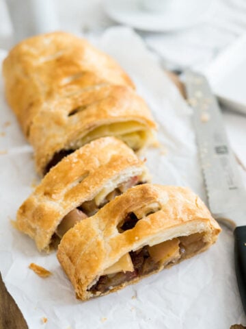 This Puff Pastry Walnut Apple Strudel is made with a Walnut Raisin Apple filling and doesn't get a soggy bottom because of my secret ingredient!