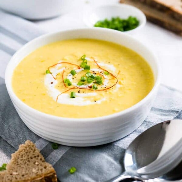 This Curried Cream of Corn Soup is creamy, a little bit spicy, and full of flavor! It makes a great weeknight meal - 15 minutes and you have a delicious meal. Serve with baguette or pita bread!