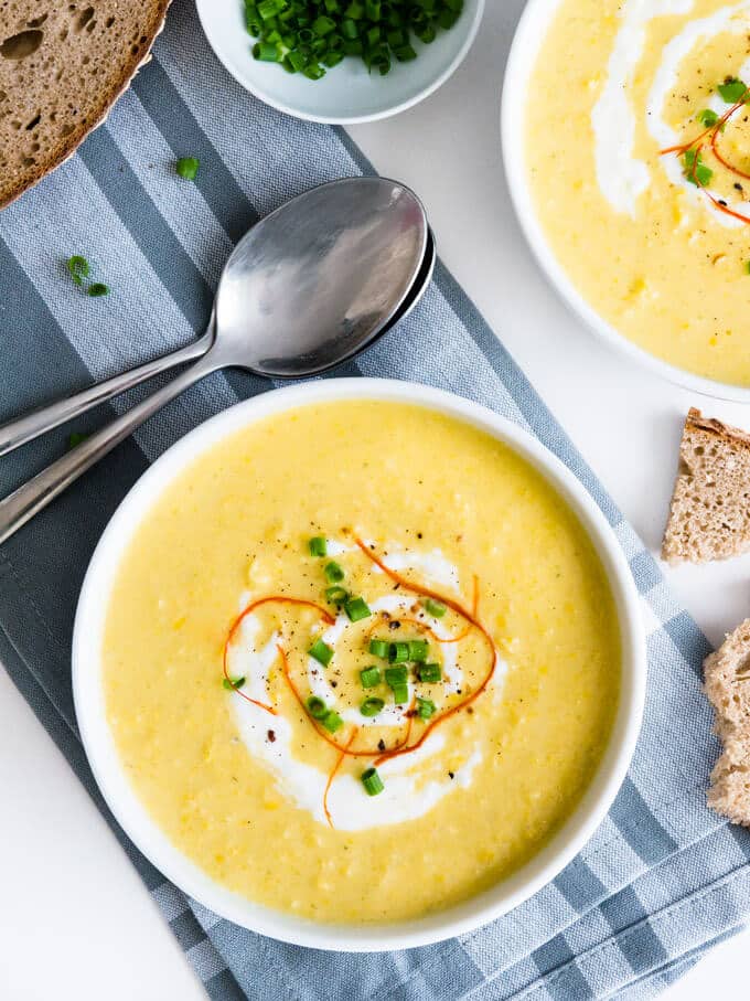 This Curried Cream of Corn Soup is creamy, a little bit spicy, and full of flavor! It makes a great weeknight meal - 15 minutes and you have a delicious meal. Serve with baguette or pita bread!