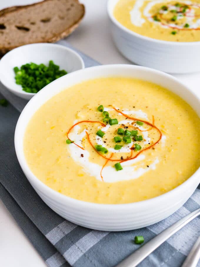 This Curried Cream of Corn Soup is creamy, a little bit spicy, and full of flavor! It makes a great weeknight meal - 15 minutes and you have a delicious meal. Serve with baguette or pita bread!