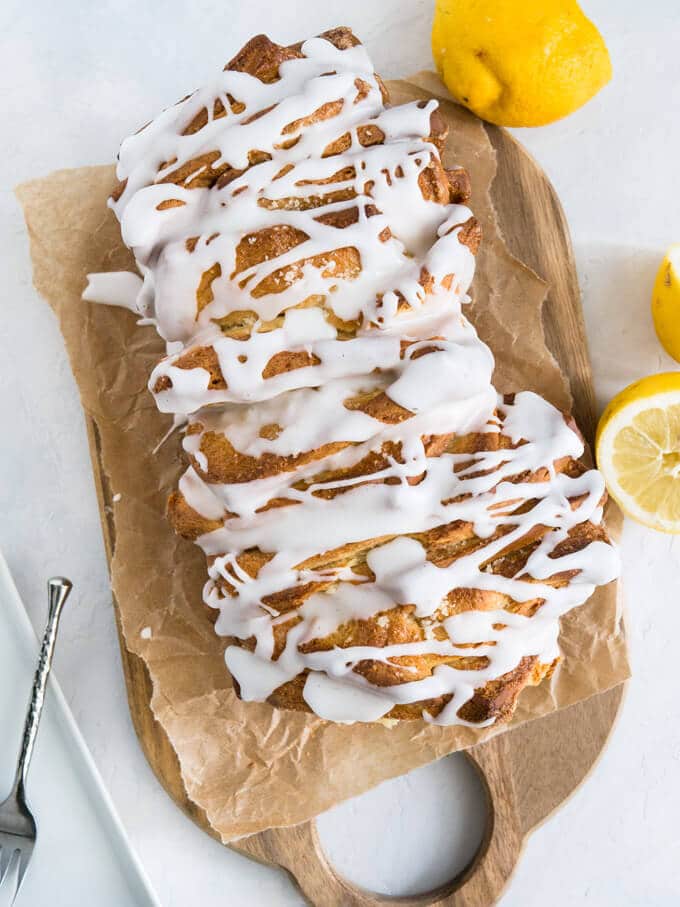 Lemon Pull Apart Coffee Cake - A beautiful light and fluffy sweet bread, filled with lemon butter and topped with a tangy lemon glaze!