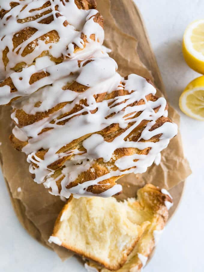 Lemon Pull Apart Coffee Cake - A beautiful light and fluffy sweet bread, filled with lemon butter and topped with a tangy lemon glaze!