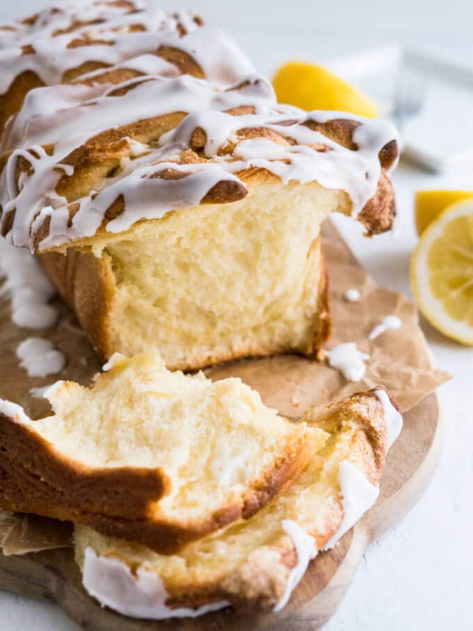 Lemon Pull Apart Bread - A beautiful light and fluffy sweet bread, filled with lemon butter and topped with a tangy lemon glaze!