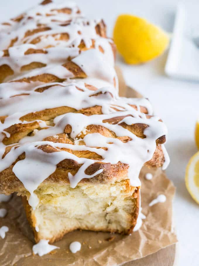 Lemon Pull Apart Coffee Cake - A beautiful light and fluffy sweet bread, filled with lemon butter and topped with a tangy lemon glaze!