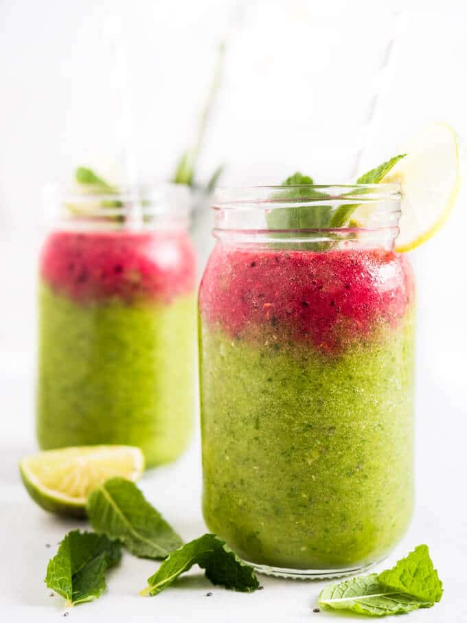 This vegan Coconut Water Smoothie is packed with raspberries, baby spinach, chia, and mango! Loaded with fruits, veggies, and coconut water, this drink is healthy and delicious!