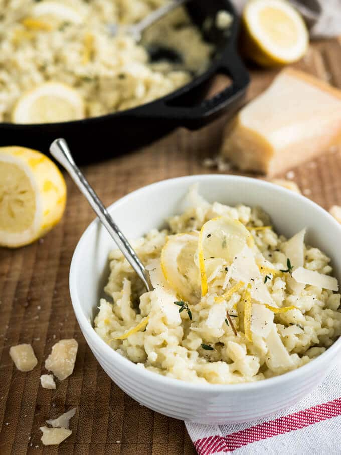 Creamy Lemon Risotto is a perfect summer dish made with parmesan, rosemary, and fresh lemons. Comfort food for sunny days or whenever you need a little bit sunshine in your life!