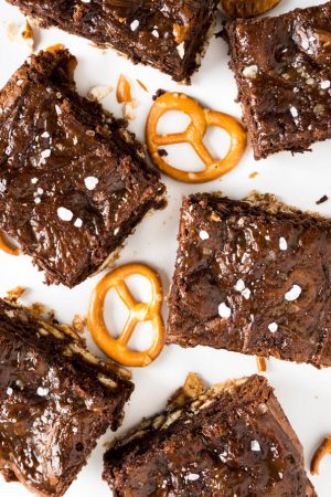 Salted Caramel Pretzel Brownies have a crunchy pretzel crust and are made with Nutella! These are not your ordinary brownies, they are chewy, salty, sweet, chocolatey, and crunchy!
