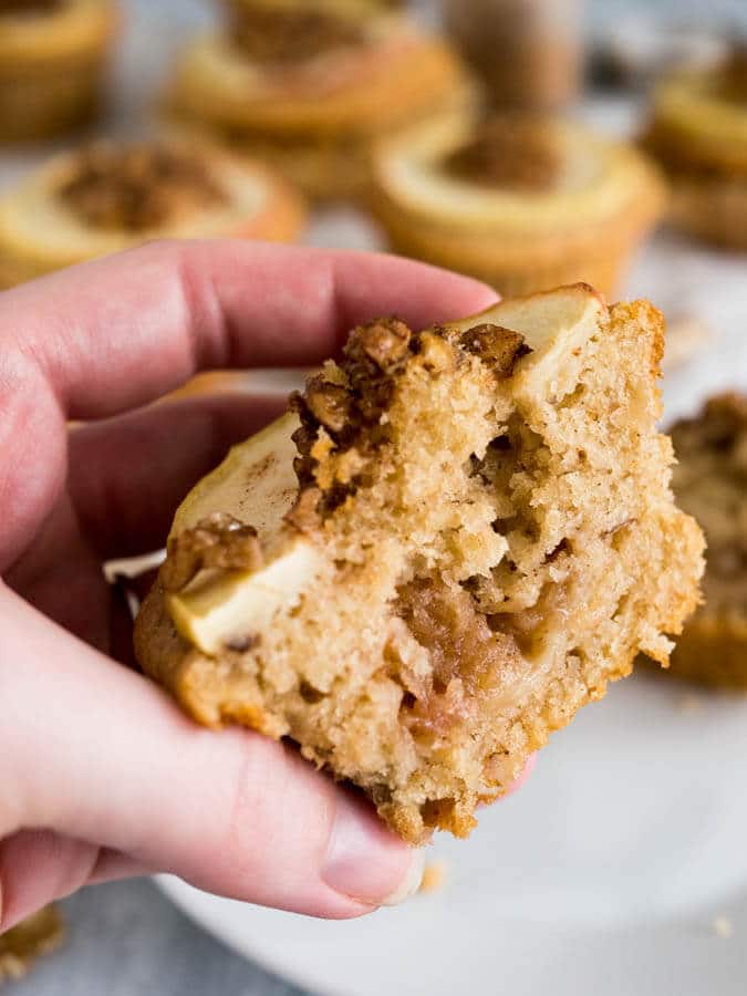 Apple Cinnamon Muffins are made with brown butter and topped with caramelized walnuts! They have a secret filling which makes them extra moist and delicious. 