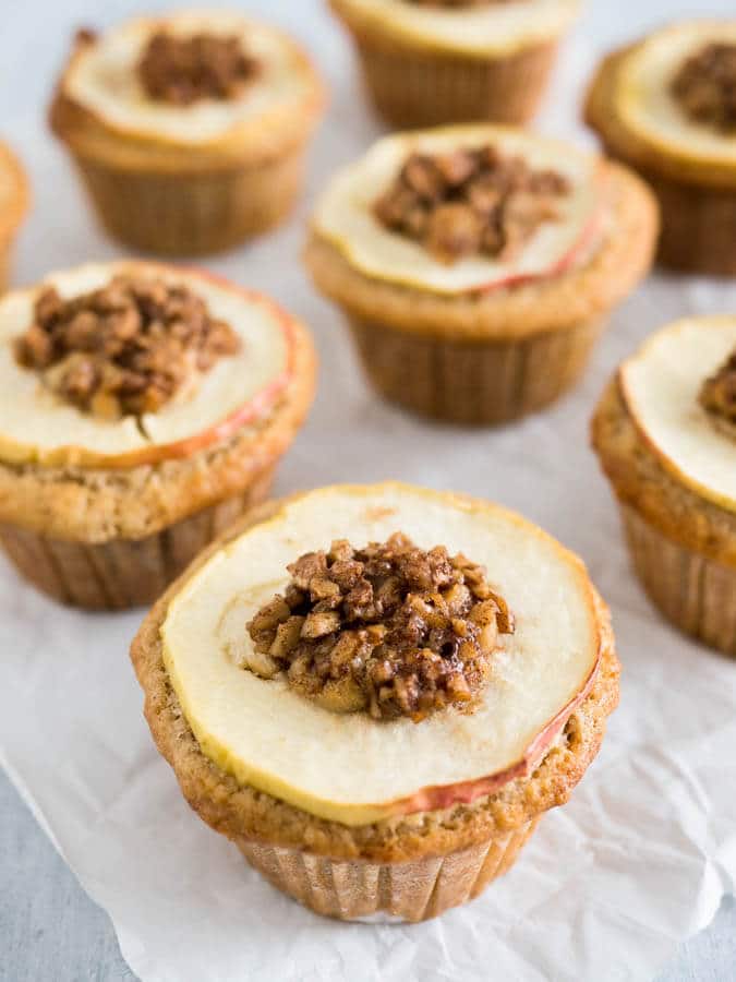 Apple Cinnamon Muffins are made with brown butter and topped with caramelized walnuts! They have a secret filling which makes them extra moist and delicious. 