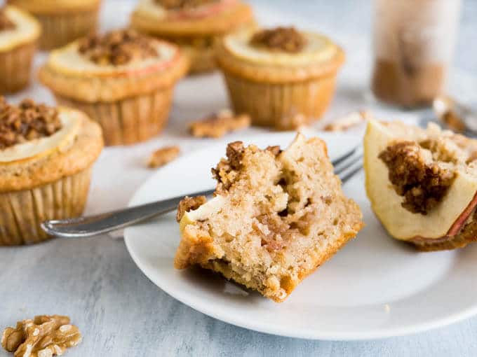 Apple Cinnamon Muffins are made with brown butter and topped with caramelized walnuts! They have a secret filling which makes them extra moist and delicious. 