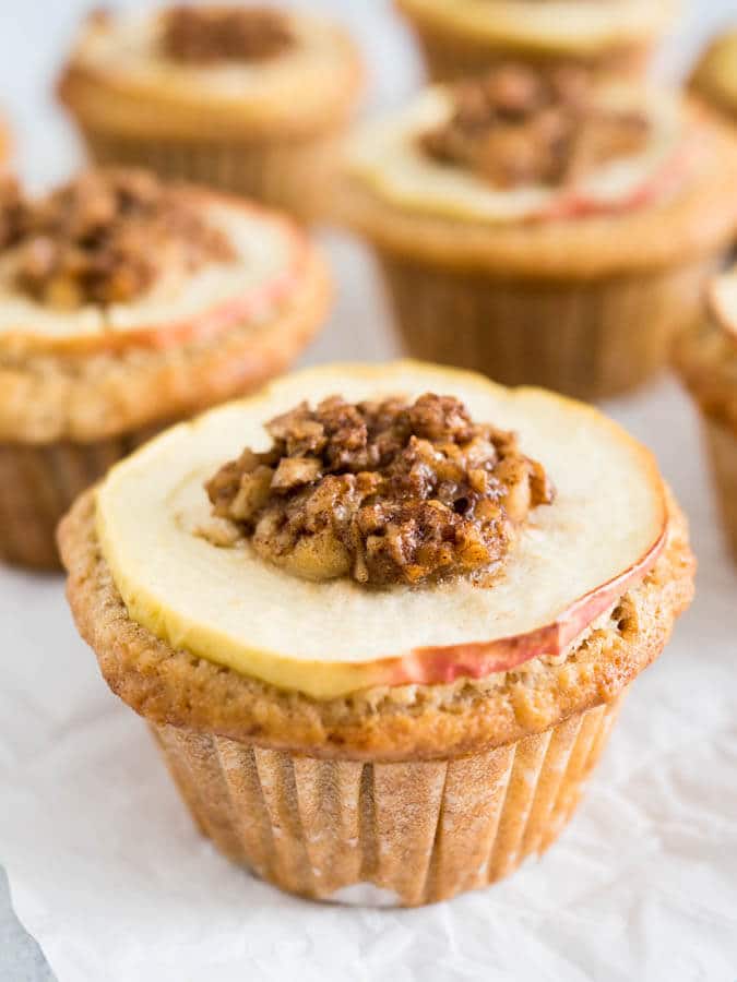 Apple Cinnamon Muffins are made with brown butter and topped with caramelized walnuts! They have a secret filling which makes them extra moist and delicious. 