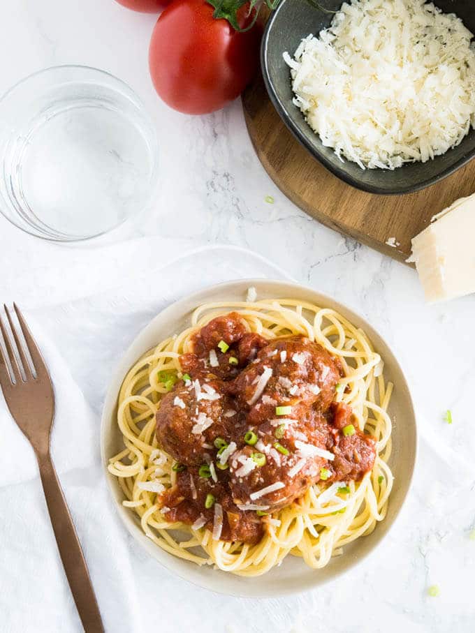 Easy Crockpot Italian Meatballs smothered in a homemade marinara sauce made with Italian herbs and balsamic vinegar. This recipe comes together in minutes and will have everybody begging for seconds!