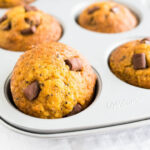 Chai-spiced Pumpkin Chocolate Chip Muffins - these moist muffins are made with pumpkin puree, chocolate chips, and warming chai spices. You only need one bowl to make these super easy fall breakfast treats!