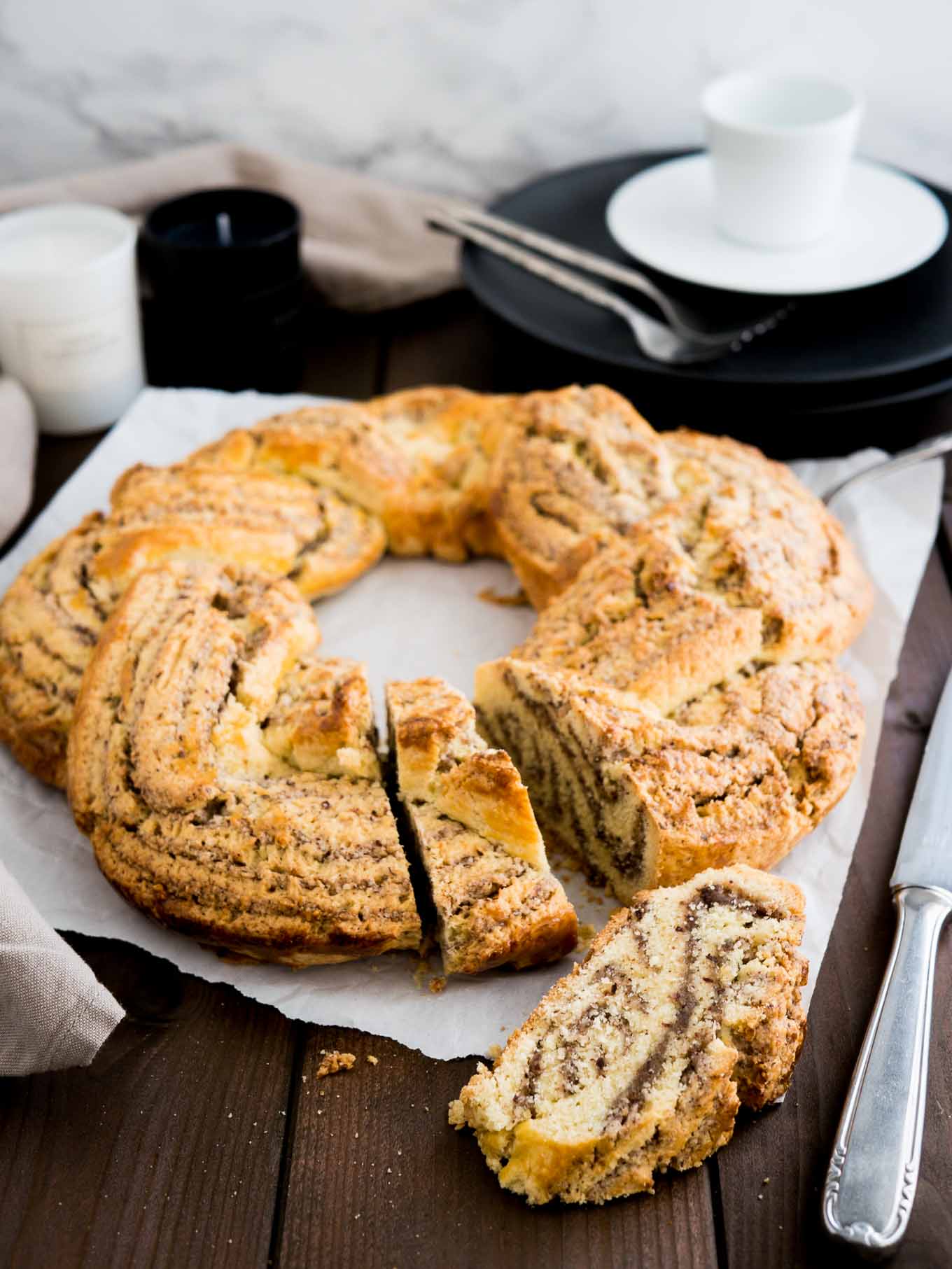 This easy Nut Roll recipe is my husband's grandma's which she makes at every special occasion! It's made without yeast and filled with ground hazelnuts. A perfect Holiday breakfast or dessert!