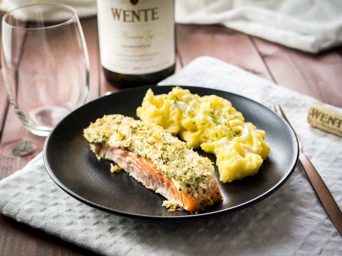 This Horseradish Parmesan crusted Salmon is baked in the oven and only takes 20 minutes to make. A dinner fancy enough for guests but also easy enough for weeknights!