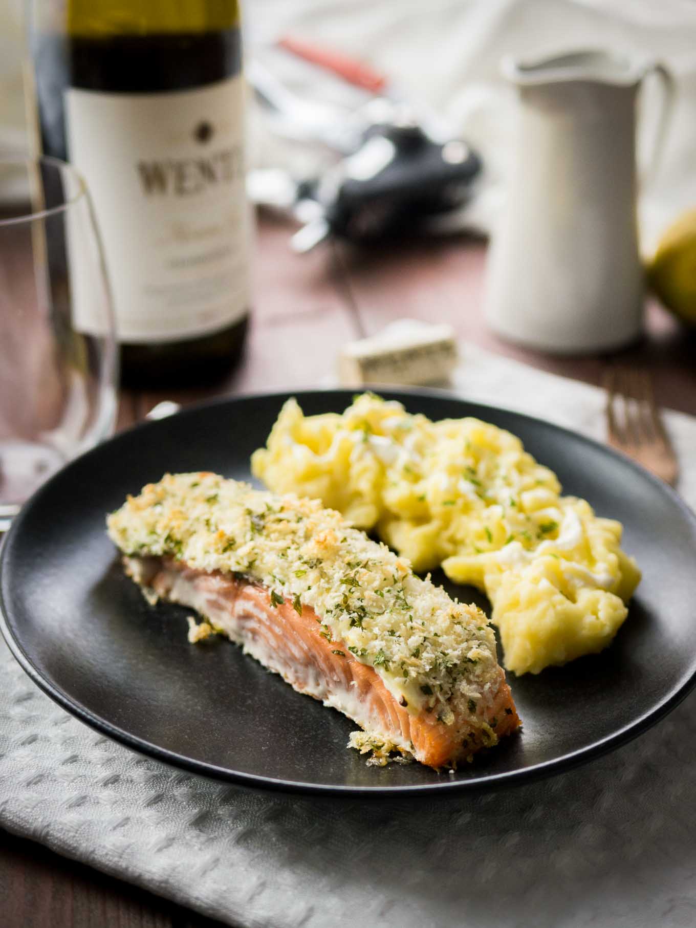 This Horseradish Parmesan crusted Salmon is baked in the oven and only takes 20 minutes to make. A dinner fancy enough for guests but also easy enough for weeknights!