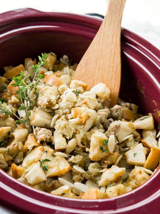This easy Crockpot Italian Sausage Apple Stuffing with Brioche bread and almonds only takes 15 minutes to prep! A perfect Thanksgiving side dish!