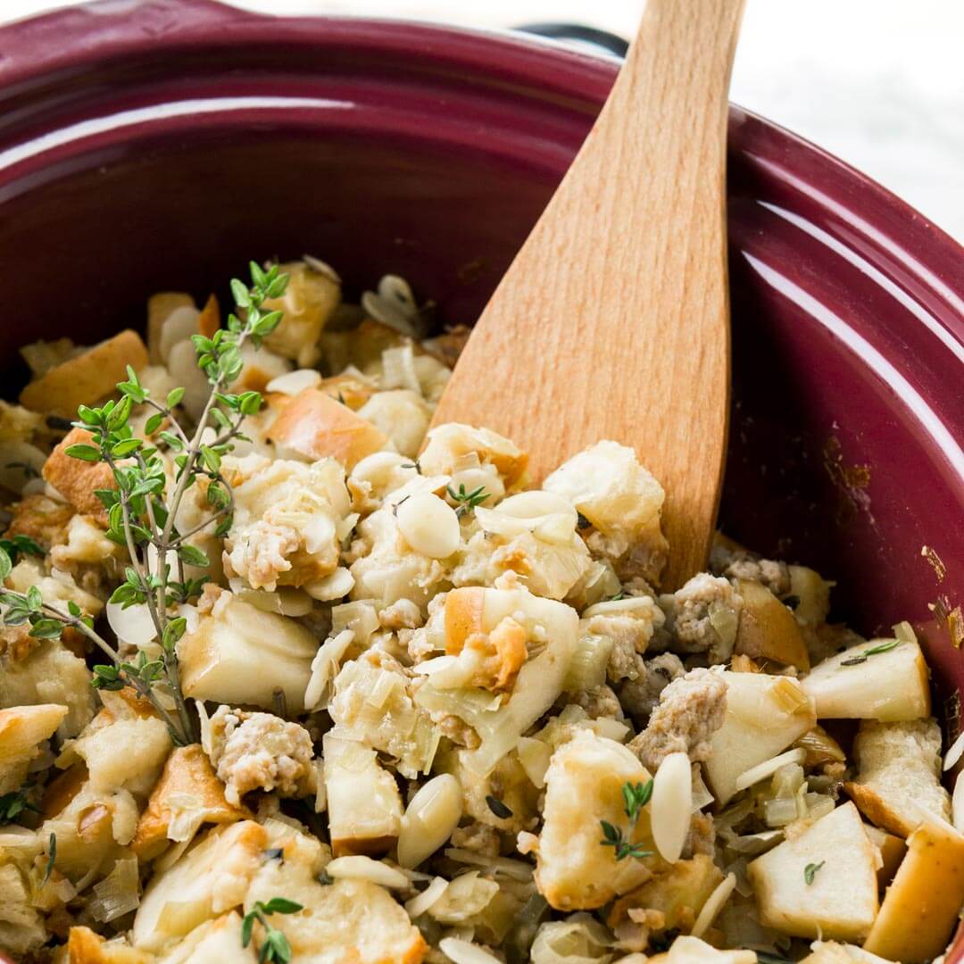 This easy Crockpot Italian Sausage Apple Stuffing with Brioche bread and almonds only takes 15 minutes to prep! A perfect Thanksgiving side dish!