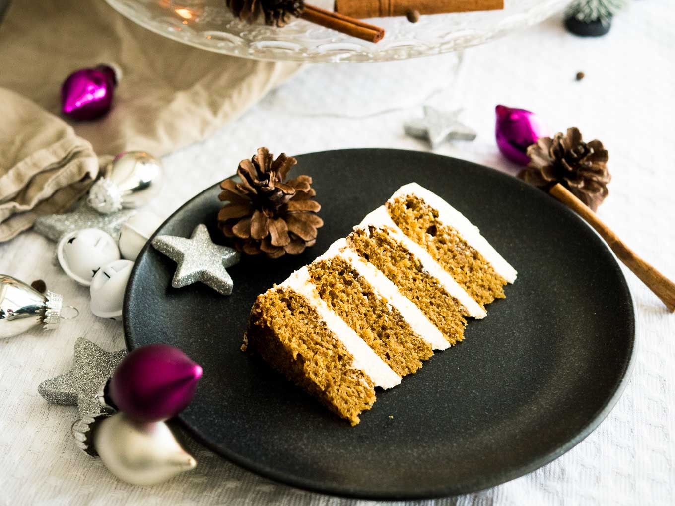 This Gingerbread Cake recipe is perfect for the holidays! A spicy and sweet ginger cake with a delicious Baileys cream cheese frosting.