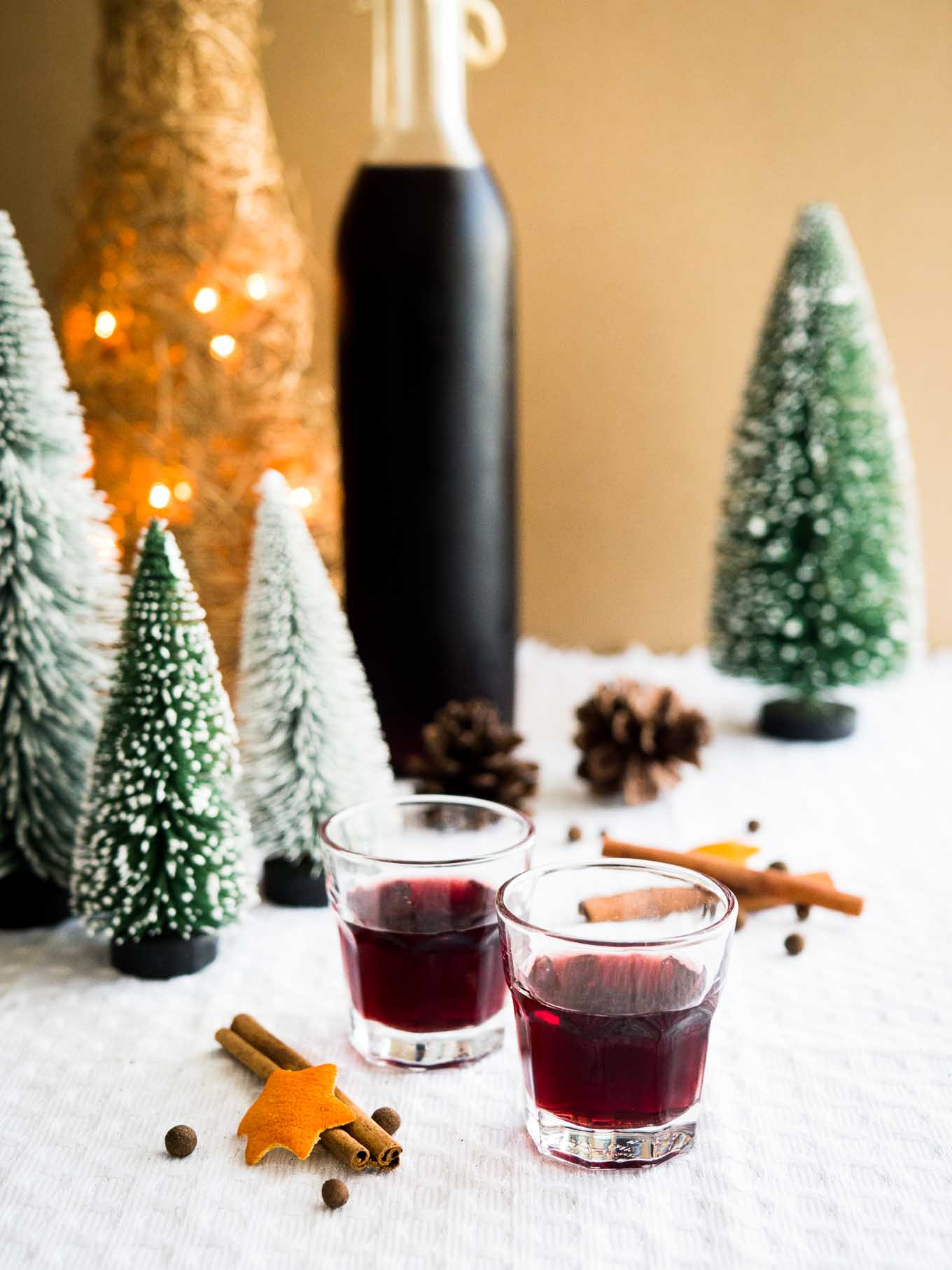 This easy mulled wine liqueur makes a perfect Christmas gift! Dark rum and red wine are infused with mulling spices, making this homemade drink as festive as the holiday season gets.