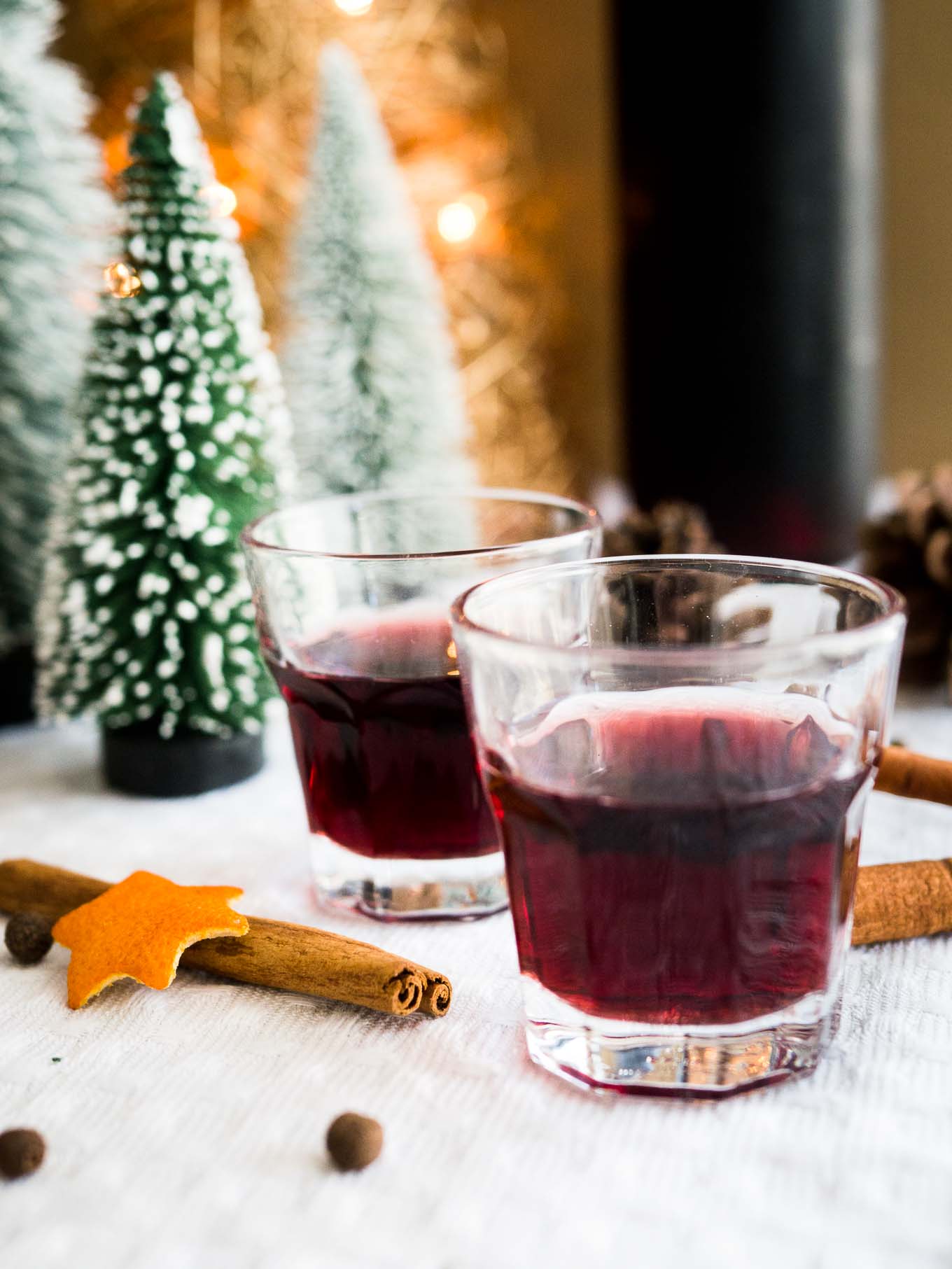 This easy mulled wine liqueur makes a perfect Christmas gift! Dark rum and red wine are infused with mulling spices, making this homemade drink as festive as the holiday season gets. 