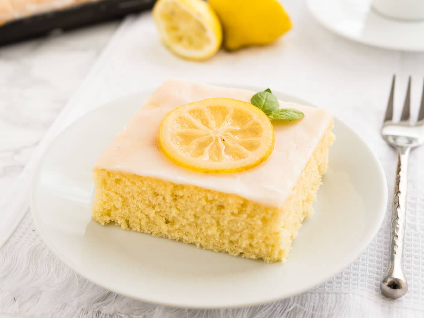 https://platedcravings.com/wp-content/uploads/2017/01/Easy-Lemon-Sheet-Cake-Plated-Cravings-11.jpg