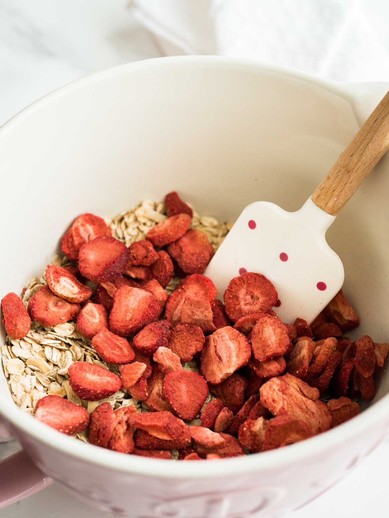 These Strawberry Baked Oatmeal Cups are perfect for busy mornings! A healthy grab-and-go breakfast or snack filled with oats, strawberries, and chia seeds.