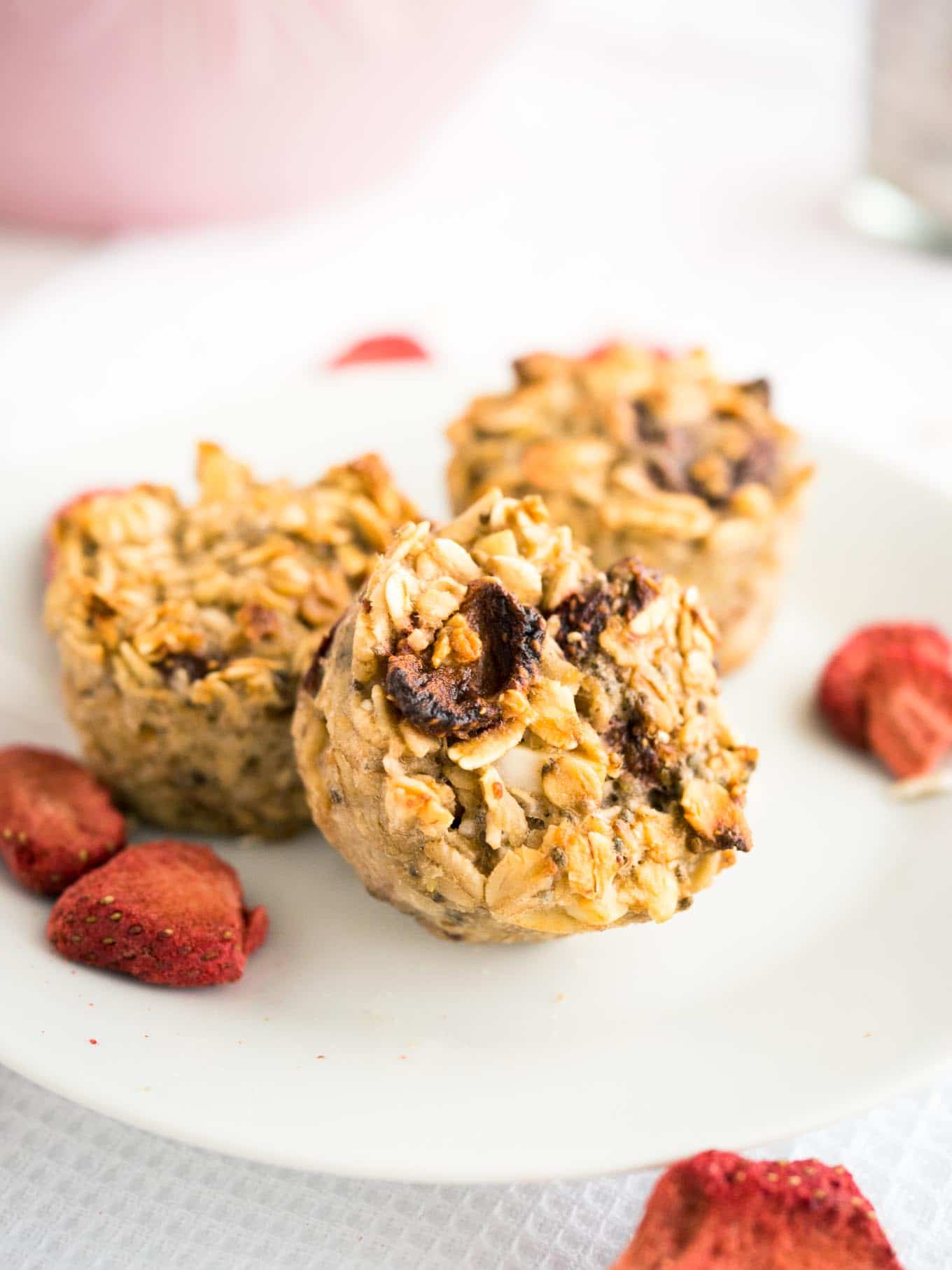 These Strawberry Baked Oatmeal Cups are perfect for busy mornings! A healthy grab-and-go breakfast or snack filled with oats, strawberries, and chia seeds.