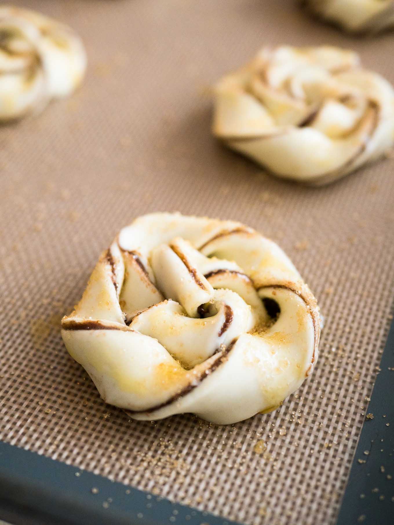 These Twisted Nutella Danish pastries are buttery, flaky, and filled with Nutella! Easy enough to whip up on a weeknight, yet special enough for a party.