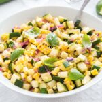 Roasted Corn Zucchini Salad is an easy but so flavorful vegetable side dish made with fresh corn, zucchini, and onions. A delicious summer salad that will dress up every meal.