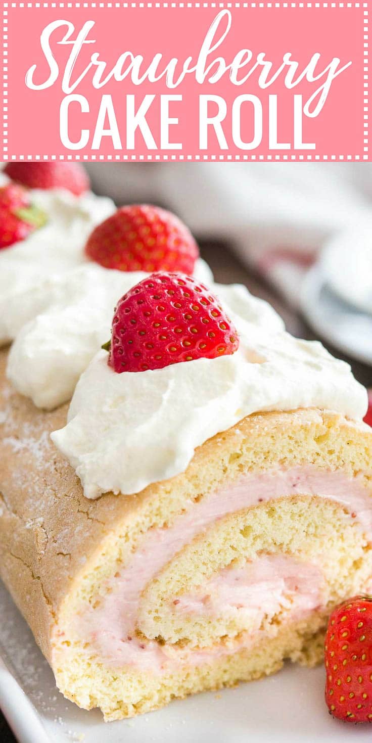 Image with text: Strawberry cake roll, image: Close-up of a strawberry swiss cake roll topped with whipped cream and strawberries on a rectangular serving platter.