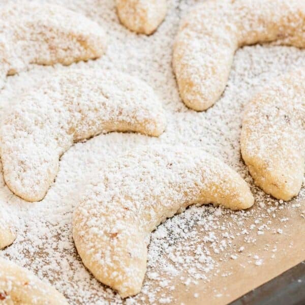 Vanillekipferl dusted with powdered vanilla sugar.