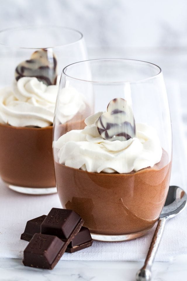 Chocolate Mousse in a glass, topped with whipped cream