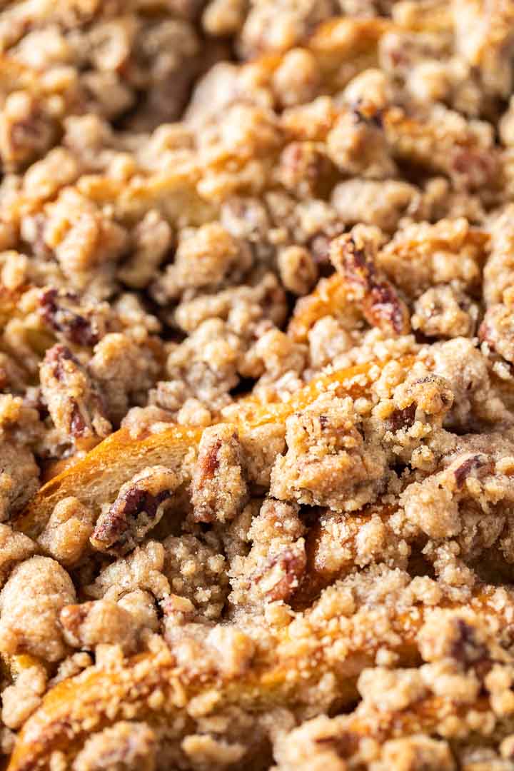 Close up of french toast casserole with streusel and pecans.