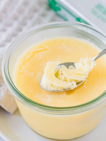 Clarified Butter in a glass jar, with a spoon