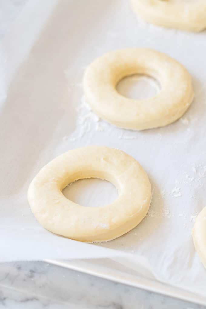 Raw Air Fryer Donuts on parchment paper