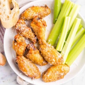 Chicken wings on a serving platter.