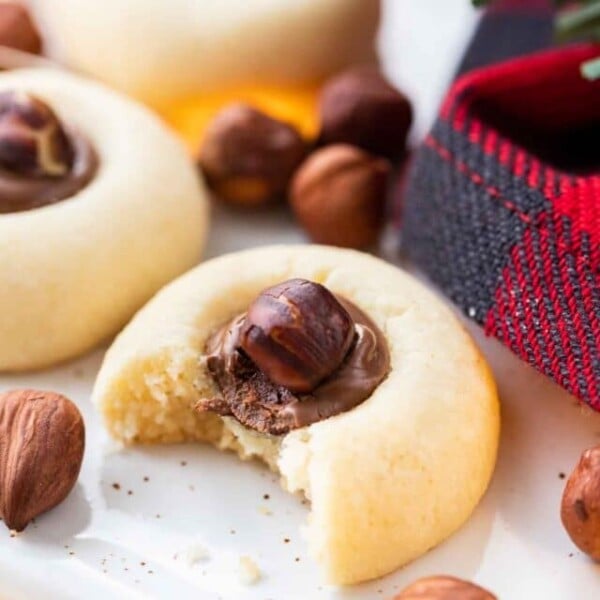 Cookie filled with Nutella with a hazelnut on top