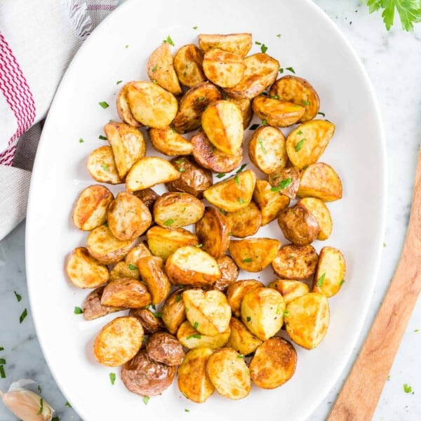 Roasted potatoes on a serving plate