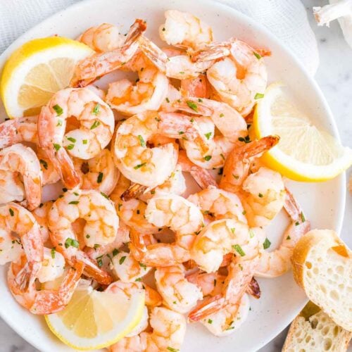 Shrimp on a plate with lemon slices