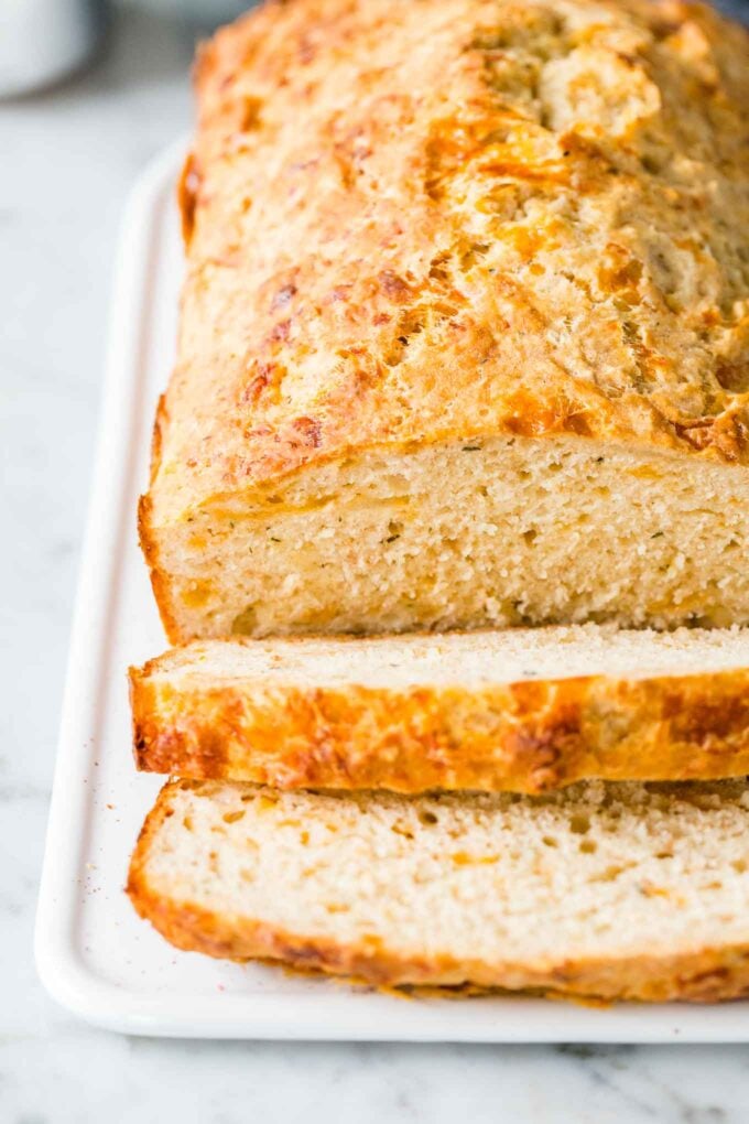 Sliced bread on a serving platter