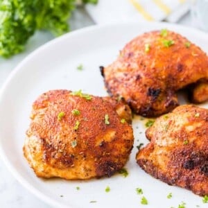 Air fried chicken thighs on a plate