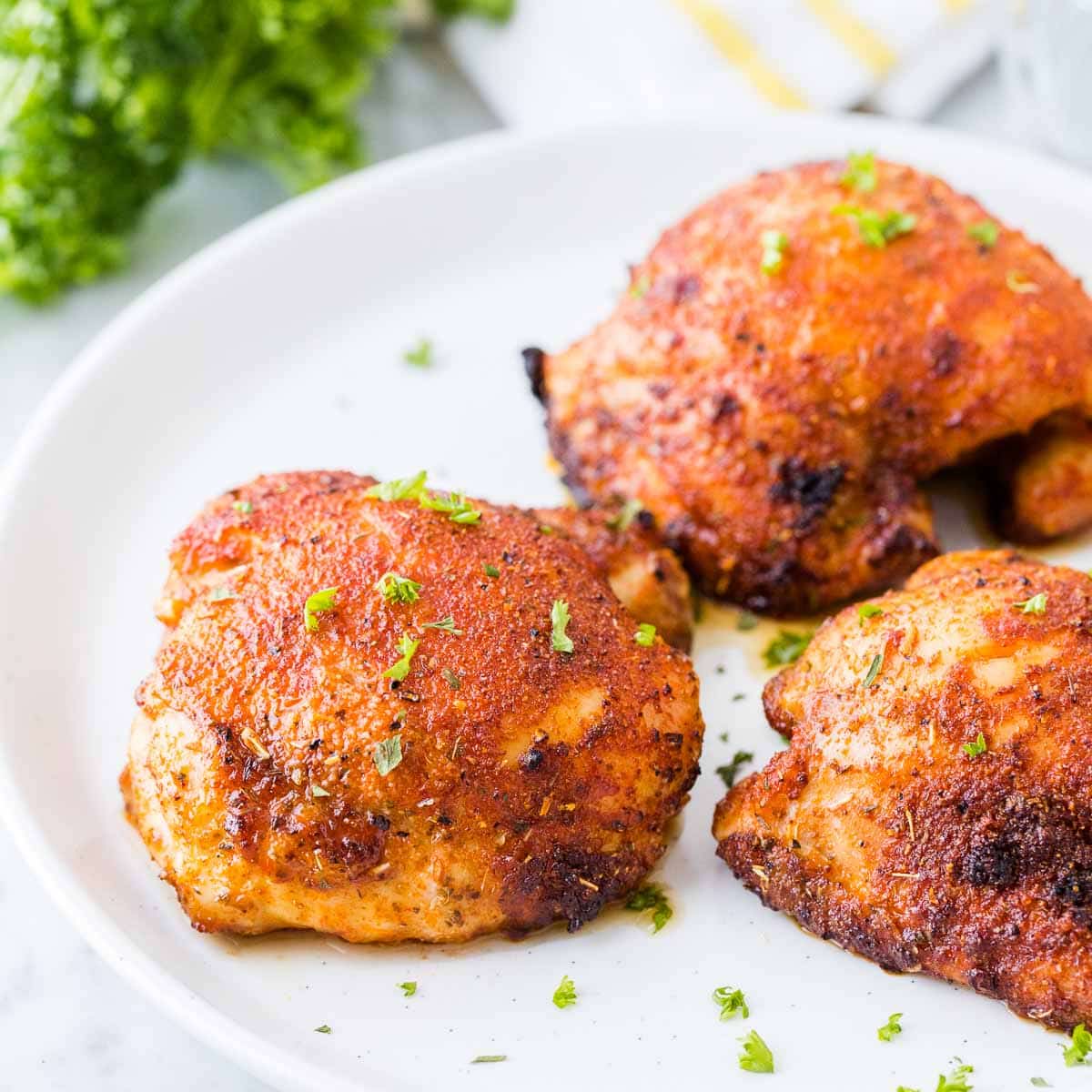 https://platedcravings.com/wp-content/uploads/2020/07/Air-Fryer-Chicken-Thighs-Featured-Plated-Cravings-1.jpg