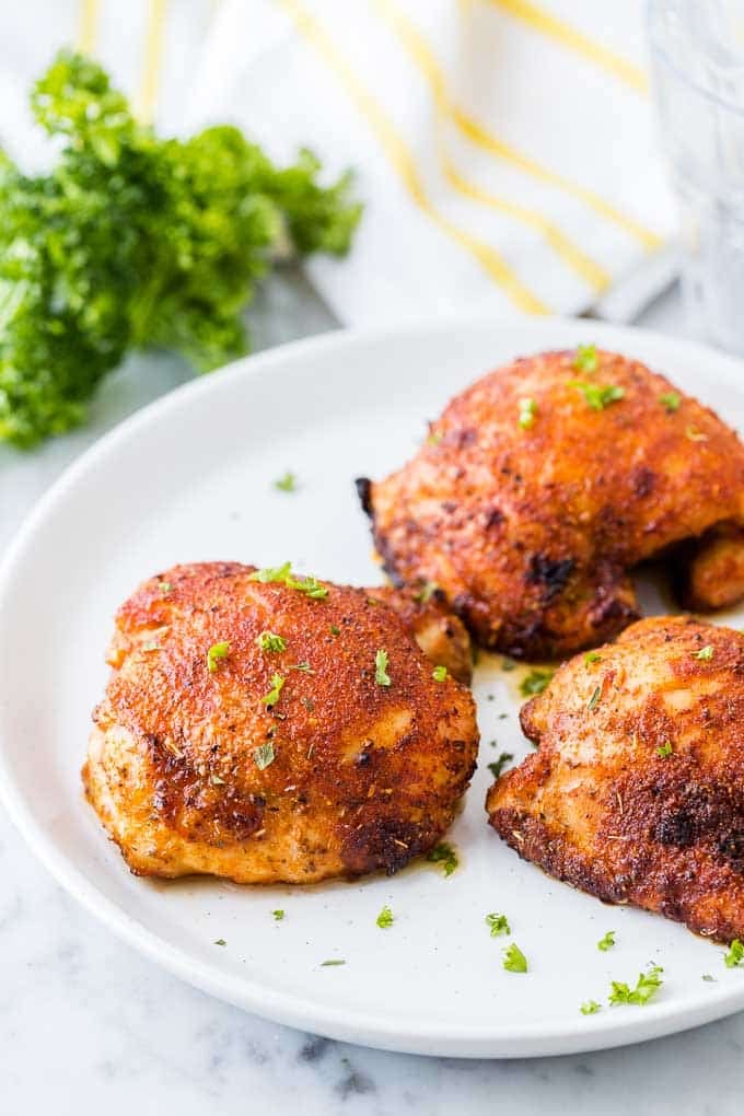 Air fried chicken thighs on a plate 
