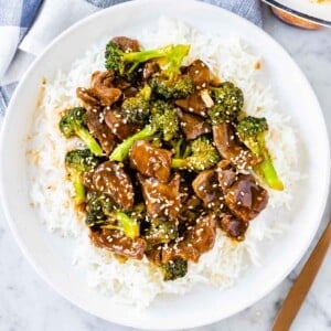 Beef and Broccoli on a plate with rice