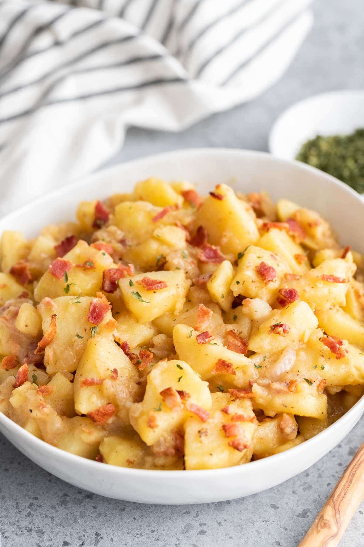 Potato salad in a white bowl